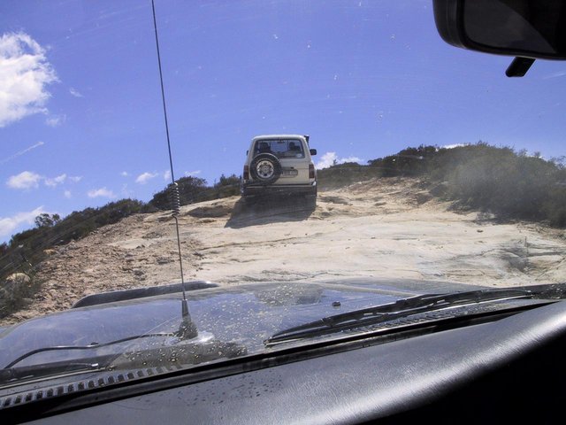 How to go up a dusty slick track