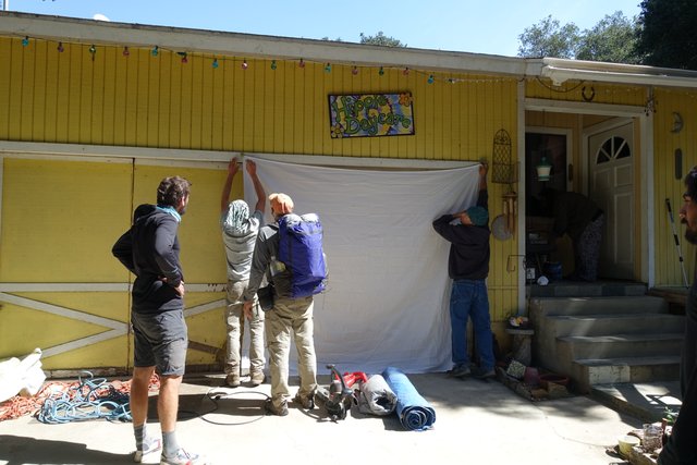 Hanging the banner at the Andersons