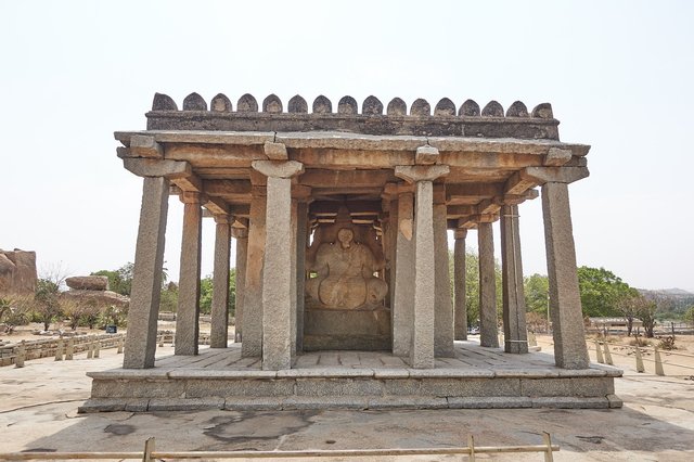 Ganesh's mother, Parvati, on his back