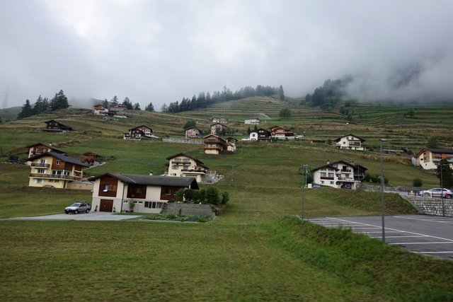 Precisely arranged chalets on the hillside