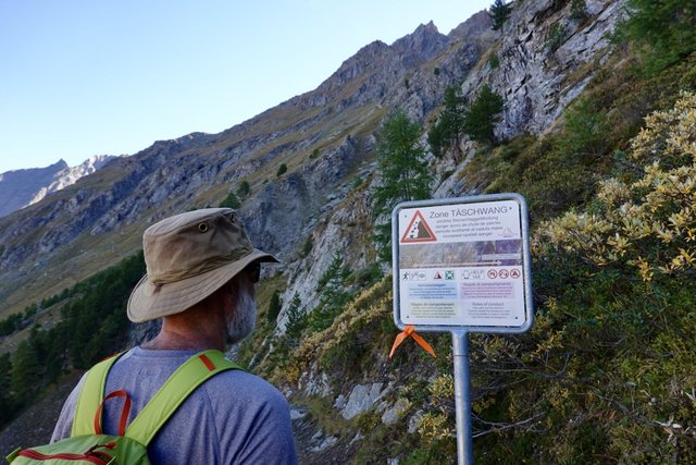 Rockfall warning; do not linger