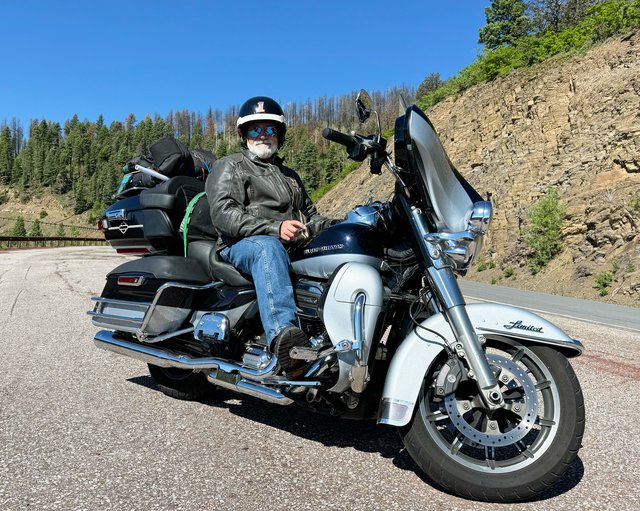 Larry, astride bike