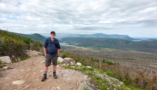 Sheldon overlooking the massive spruce budworm tree die-off in the national park