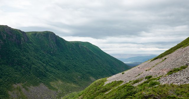 Along the scree slope.  The rocks sound awful when stepped on.